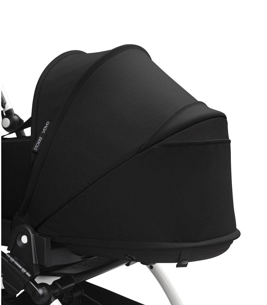 Stokke® YOYO3® Newborn Shell, Black. White Frame. Canopy ventilation open, close-up.
galery image 4